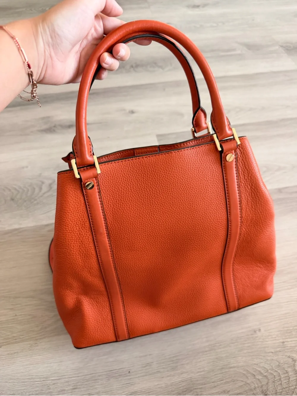 Michael Kors Orange Pebbled Leather Satchel with Gold Accents